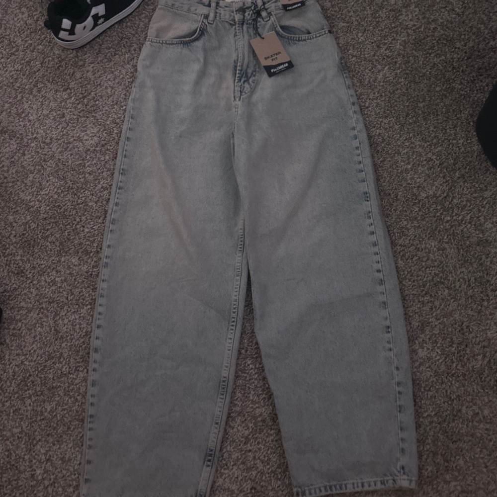 Grey mid/high rise jeans